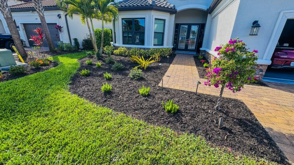 Front yard landscaping and mulch installation for residential home in Cape Coral Florida